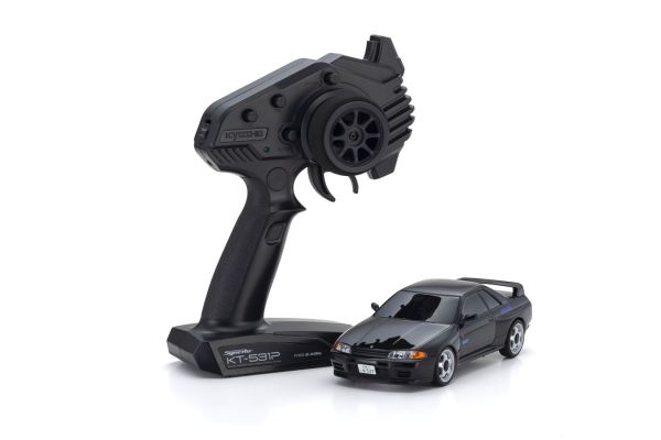Official Kyosho photo of the black Initial D R32 MINI-Z 32652ID alongside its KT-531P transmitter