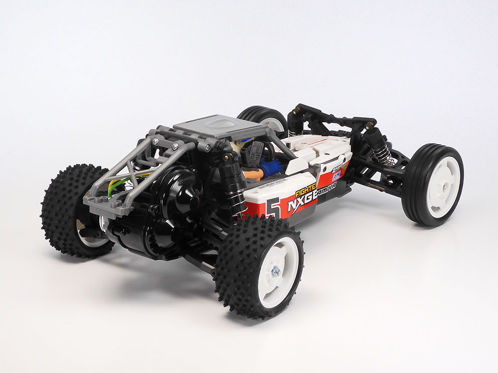 Tamiya official alternate Fighter NXGEN whole-car view: molded panels and driver on the DT-04.